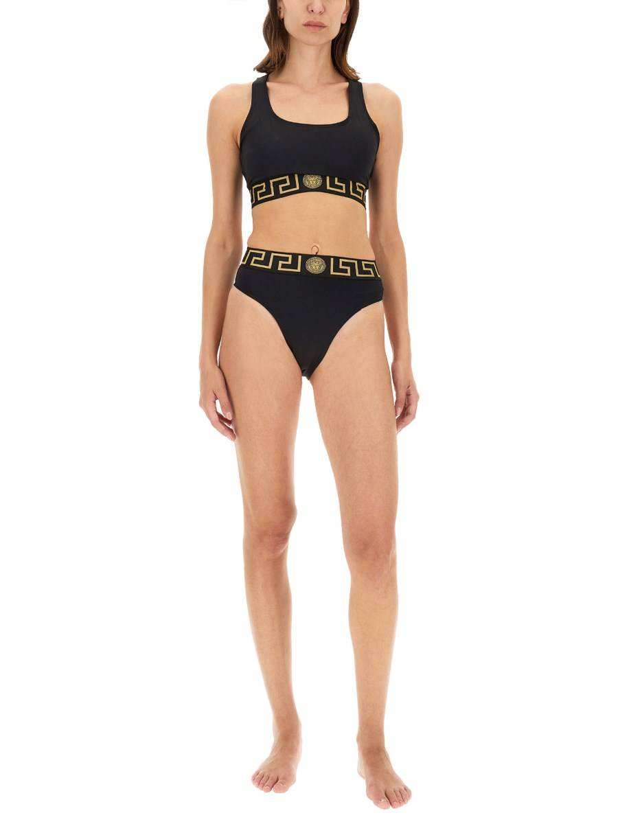 VERSACE TOP BIKINI CON BORDO GRECA ACQUISTA ORA